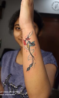 Color botanical wild bird and floral realism tattoo